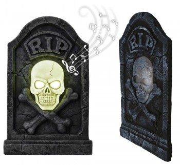 G29727 LAPIDA  CALAVERA  PIRATA CON LUZ Y SONIDO PVC 90X50 CMS